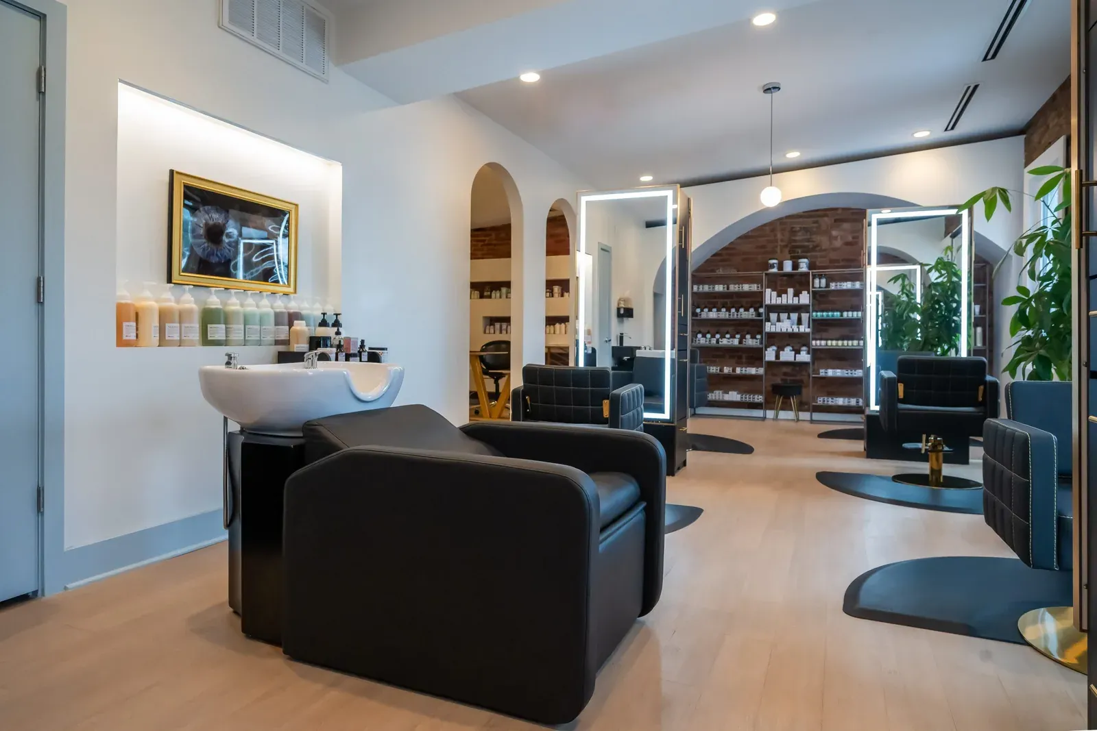 The back bar and retail wall at Mane Street